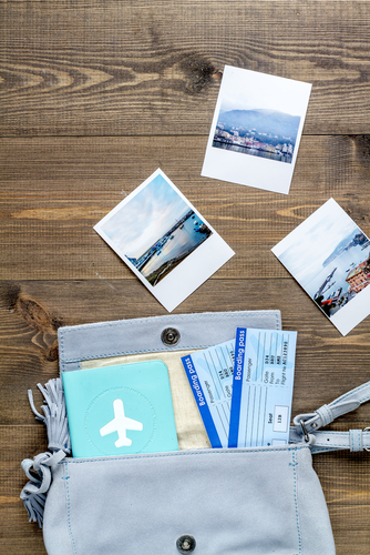 Vacation,Concept,With,Traveller,Outfit,On,Wooden,Background,Top,View